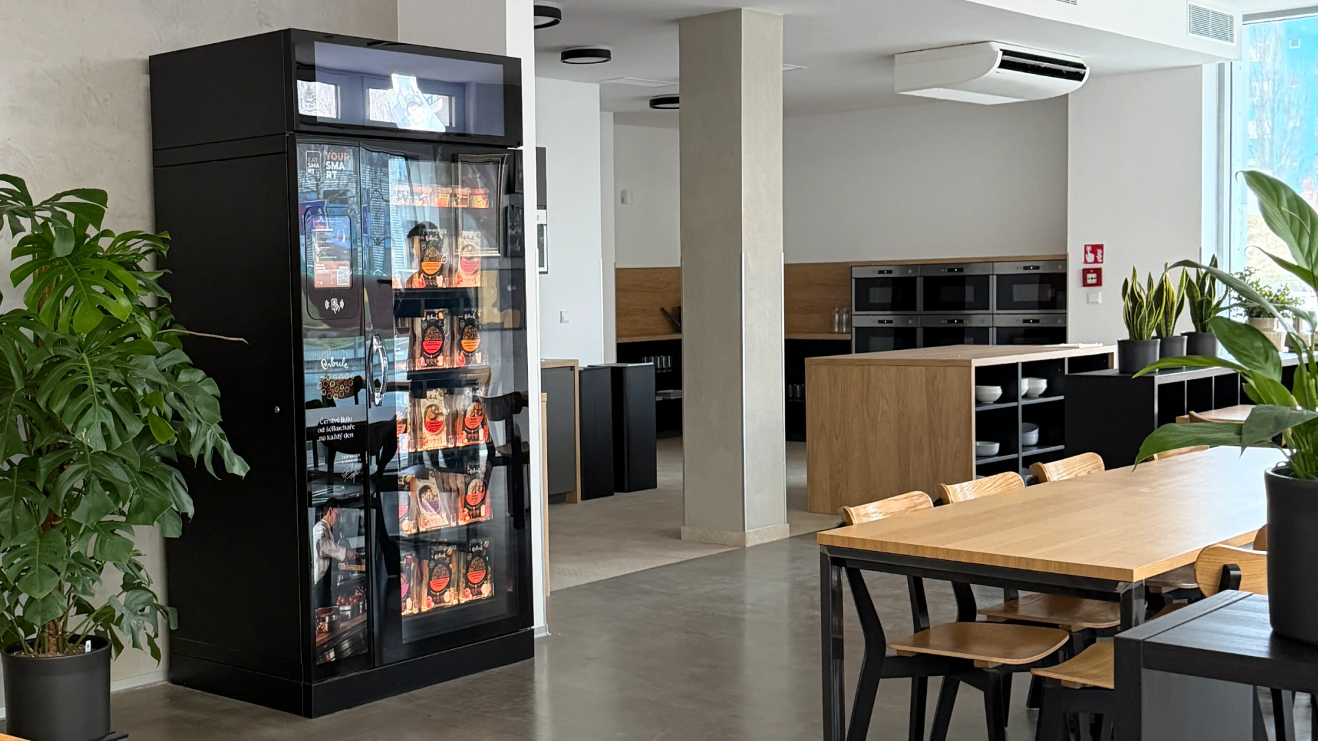 Smart fridge deployed in a modern office kitchen